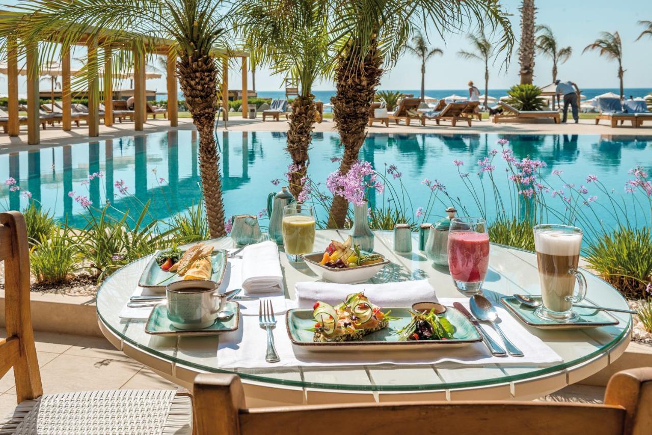 Отель Mitsis Selection Alila Фалираки Экстерьер фото Poolside dining at the Four Seasons Hotel, Tel Aviv